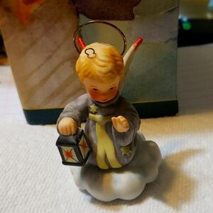 Hummel nativity was hand painted, at goebel 2000 3in, hallmark  gold crown